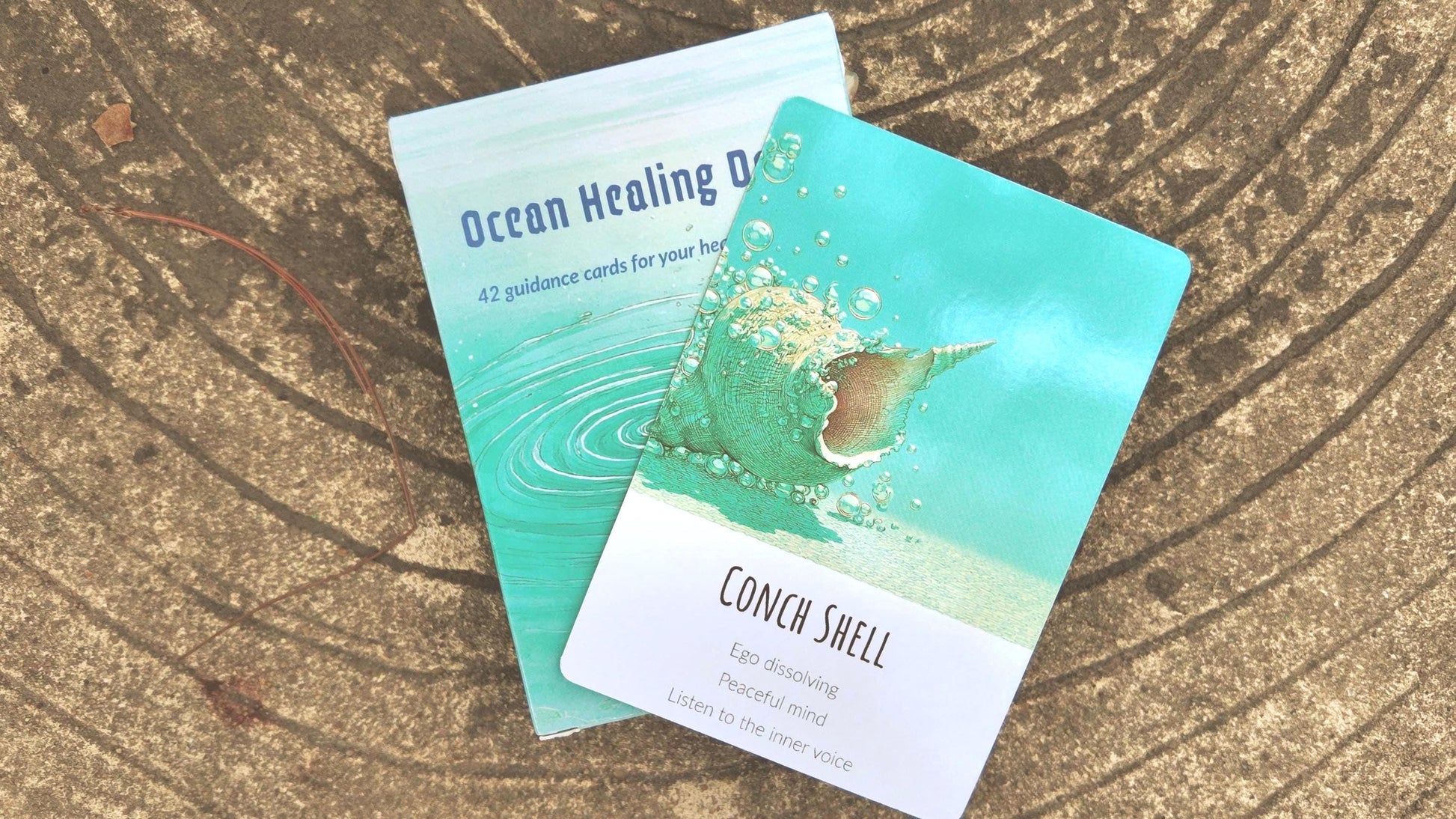Ocean Healing Oracle Deck with card box and one card displayed together