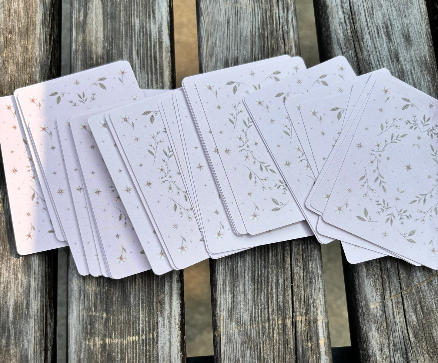 Spread of Fruit Deck oracle cards displaying the unique card back artwork and deck size.