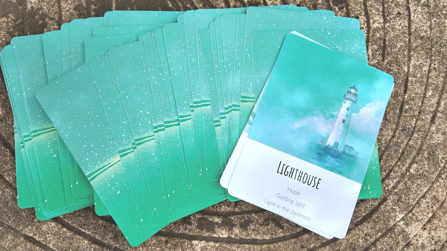 Stack of Ocean Healing Oracle Deck cards showing thickness and finish