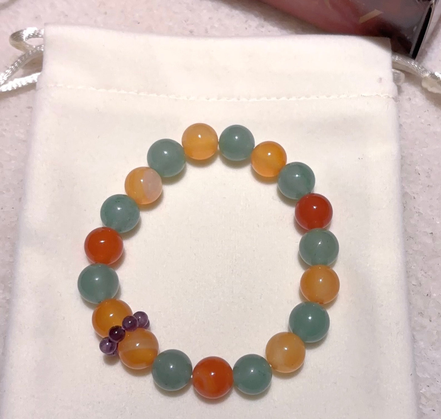 green aventurine red agate bracelet circle display minimal crystal jewelry with amethyst accent
