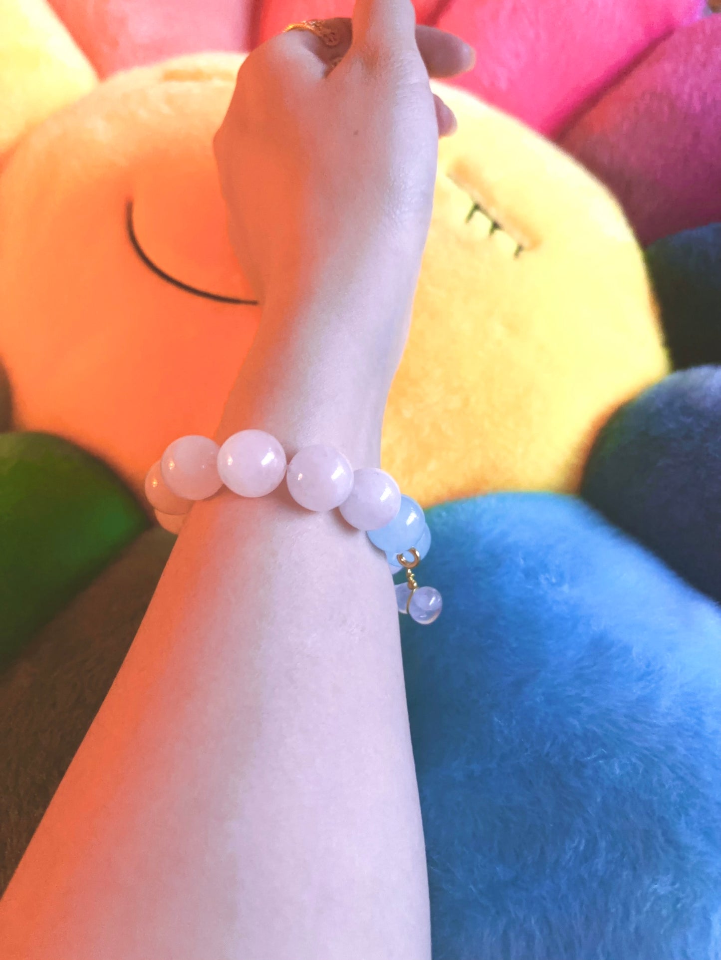 handmade crystal bracelet on wrist pink and blue beads